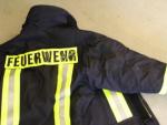 Verformung des Obermaterials der Jacke durch thermische Einwirkung